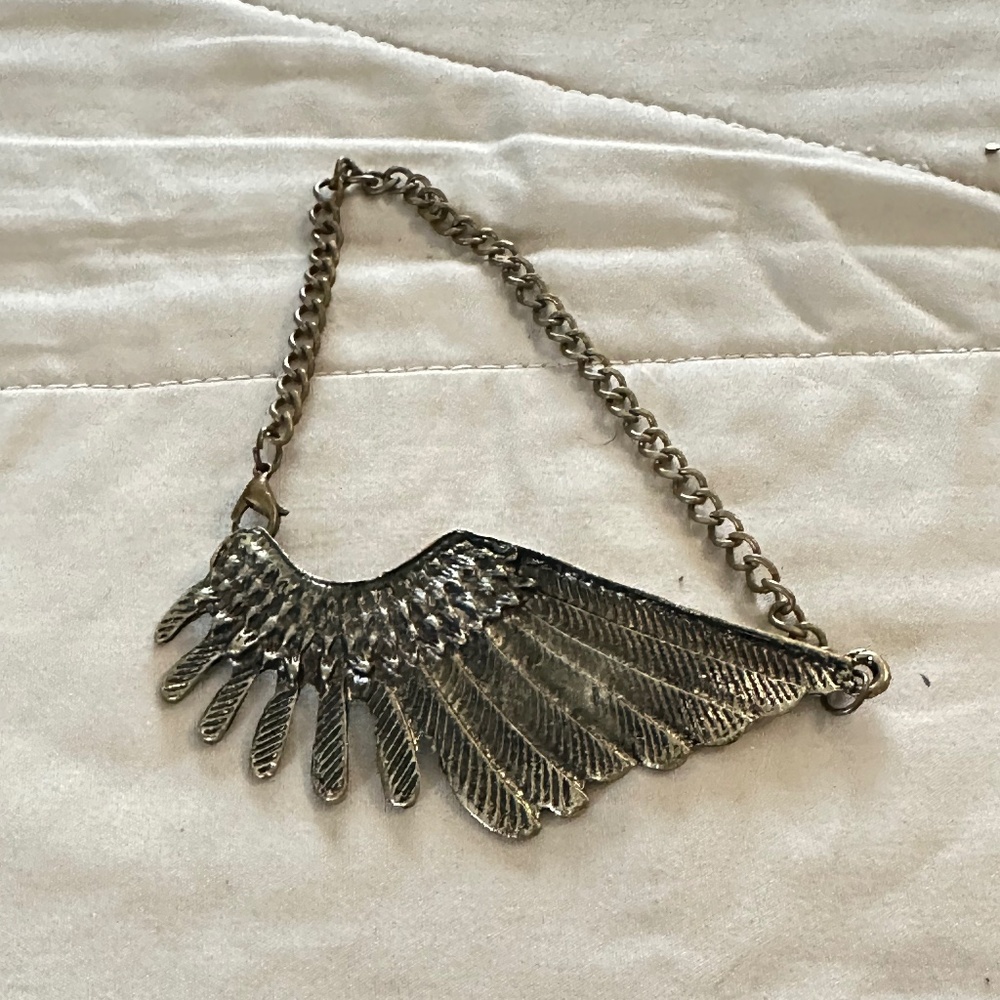 Large, Vintage Angel Wing chain anklet. Gold tone. Unknown metal.